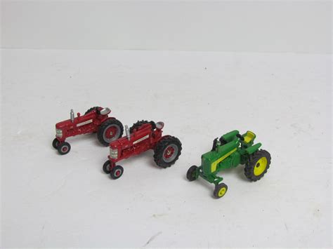 1/64th Ertl Scale International tractors and John deere tractor new un ...