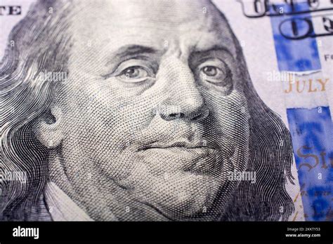 Close up of Benjamin Franklin face on 100 US dollar bill Stock Photo ...