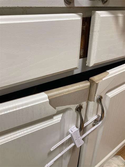 Kitchen cabinets have a vinyl wrap that is peeling. What is this ...