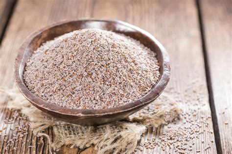 Heap of fresh Psyllium seeds (detailed close-up shot) | Vraj Psyllium