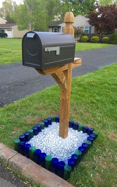 Landscape edging using Cobalt Blue and Emerald Green wine bottles ...