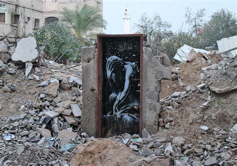 6 Photos of Street Art by Banksy in Gaza, Palestine: “People only look ...