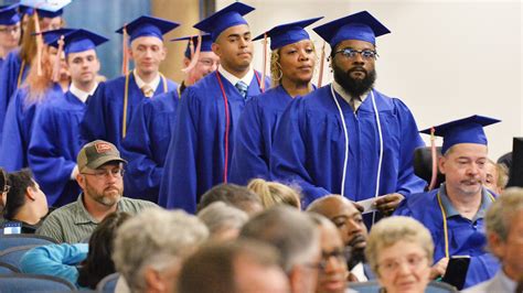 Erie County Community College graduates first class of 28 students.