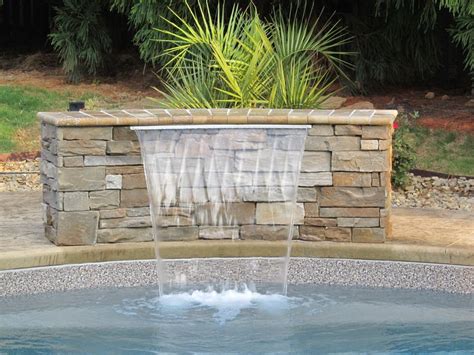 Water features can be added to any swimming pool | Pool water features ...