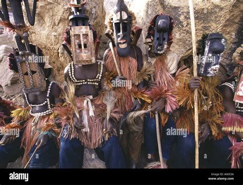 Masked Dogon Funerary dancers Bandiagara Escarpment Dogon Country Mali ...