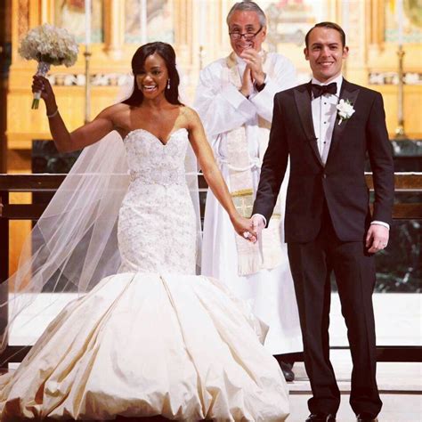 Interracial Wedding Couple Walking Down the Aisle