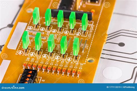 Green Rectangular Light-emitting Diodes in Rows on a Beige Printed ...