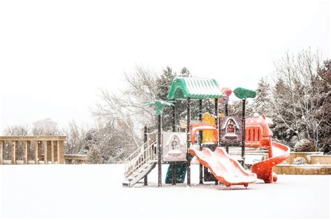 Playground in Snowy Winter Park Stock Image - Image of playground ...