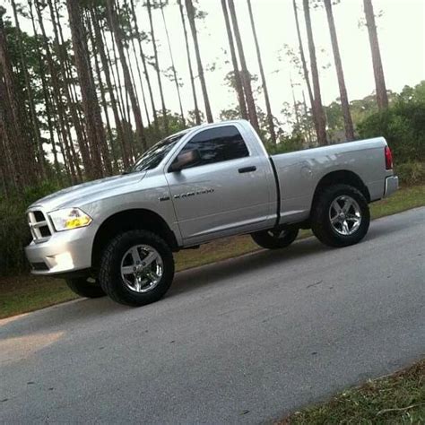 Lifted ram 1500 regular cab w/ stock wheels and rough terrain tires ...