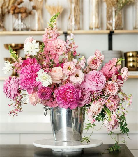 A Champagne Bucket Flower Arrangement - Flower Magazine