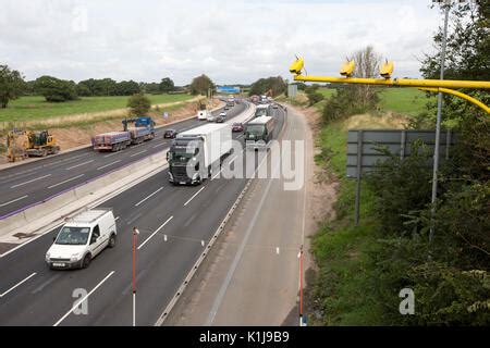 Average speed cameras on the M6 motorway in Cheshire,UK Stock Photo - Alamy