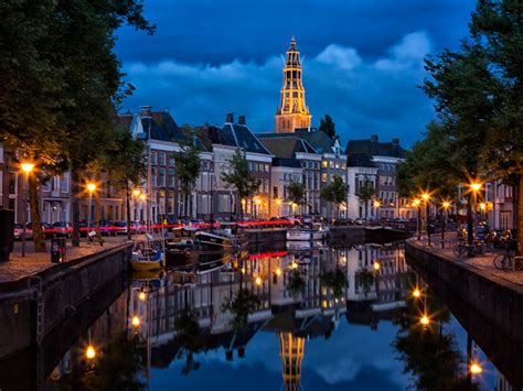 Canal in Groningen, in the north of the Netherlands, in the evening ...