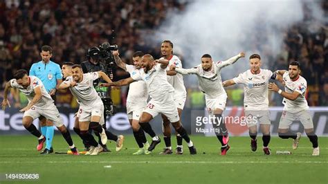 Players of Sevilla FC celebrate after Gonzalo Montiel of Sevilla FC ...