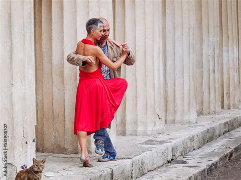 Tango nuevo dance - the famous partner dance with a woman in a red ...