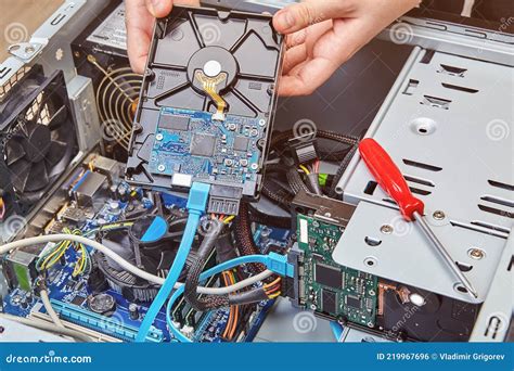 Removing Computer Hard Drive from System Unit To Replace it with New ...