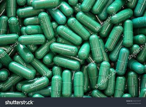 Green Capsules Pills With Medicine Antibiotic Stock Photo 344172377 ...