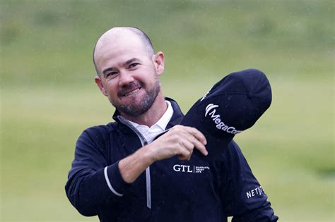 Brian Harman holds nerve to win Open Championship by six shots at rainy ...