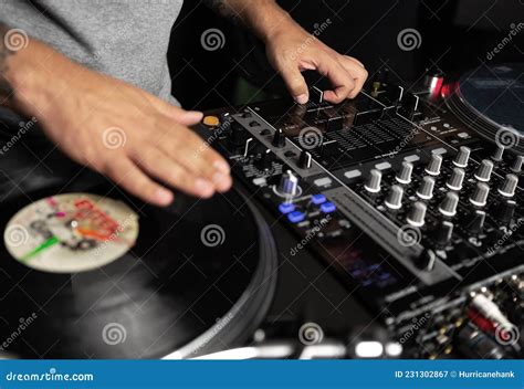 Disc Jockey Scratches Vinyl Record on Turntable Player Device in Night ...