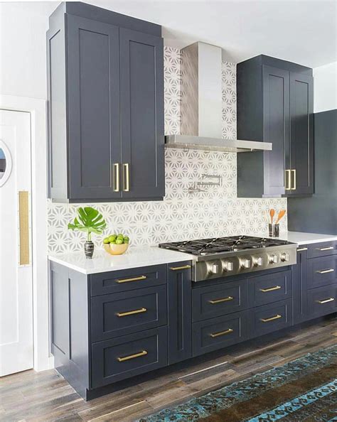 love love love this whole thing! The navy cabinets, the tile backsplash ...