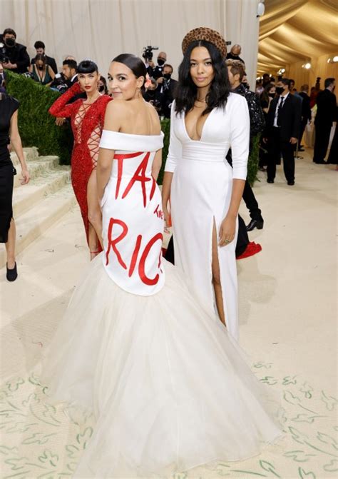 AOC turns heads at Meta Gala with 'Tax the Rich' dress