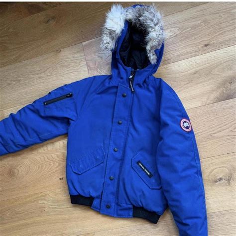 Blue authentic Canada goose coat, size 14-16 kids... - Depop