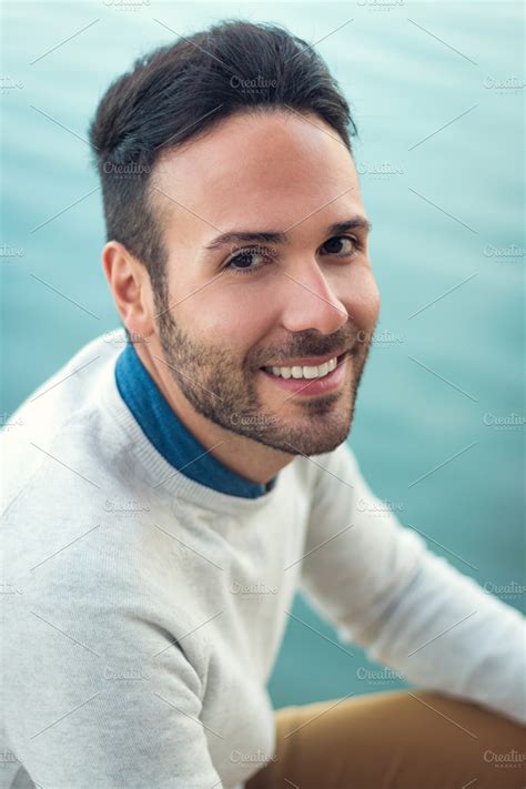 Portrait of a handsome guy smiling | High-Quality People Images ...