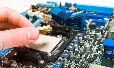 Installing the CPU into the motherboard Stock Photo | Adobe Stock