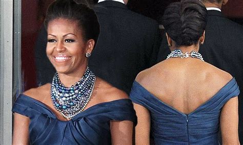 Someone's been hitting the gym again! The First Lady's designer gown ...