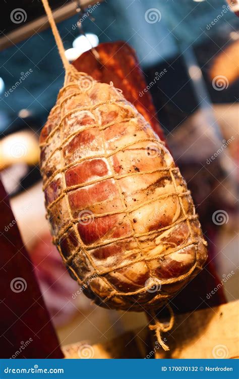 A Piece of Ham Hangs in a Rope Net. a Delicious, Beautiful Piece of ...