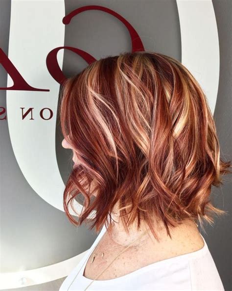 dark hair with red and blonde highlights - Lucina Mckinnon