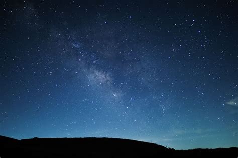 Starry sky night bridge clouds