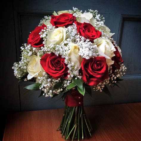 Classic white and red rose bouquet with gypsophila http://www ...