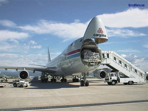 Boeing 747-400F - Cargolux Boeing 747-400F with the nose cone loading ...