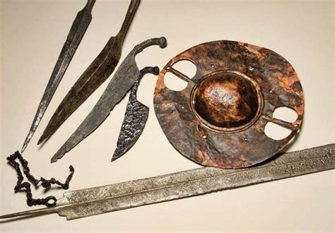 Celtic weapons; sword, spear heads, knives and, central part of the ...