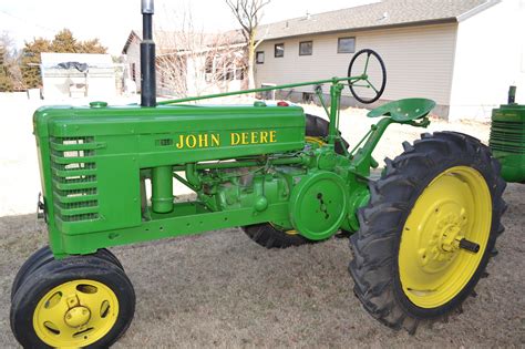 For sale at auction: Antique john deere tractors