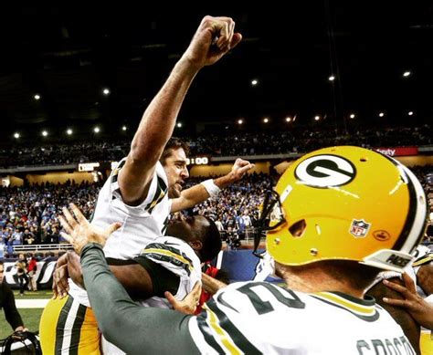 Aaron Rodgers celebrates his winning Hail Mary pass to beat the Detroit ...