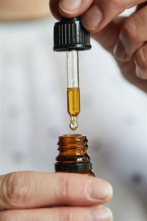 "Cannabis Oil" by Stocksy Contributor "Sally Anscombe" - Stocksy