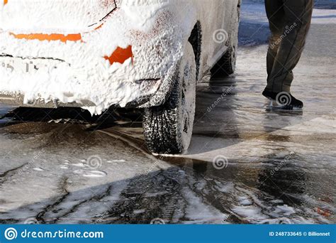 Car is Cleaning with Soap Suds at Self-service Car Wash. White Soap ...