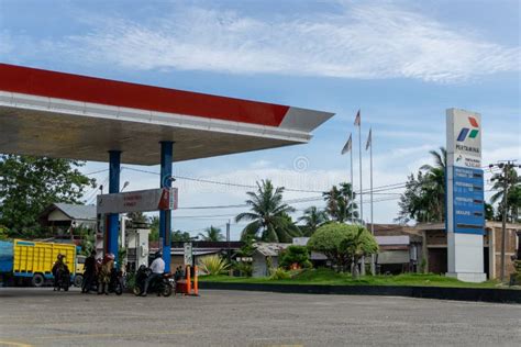 Pertamina Refueling Station. Bikers Refueling at Pertamina Gas Station ...