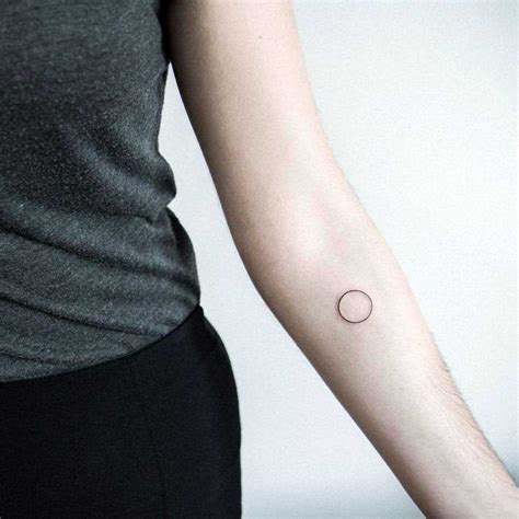 Ultra minimal circle tattoo by Dogma Noir - Tattoogrid.net