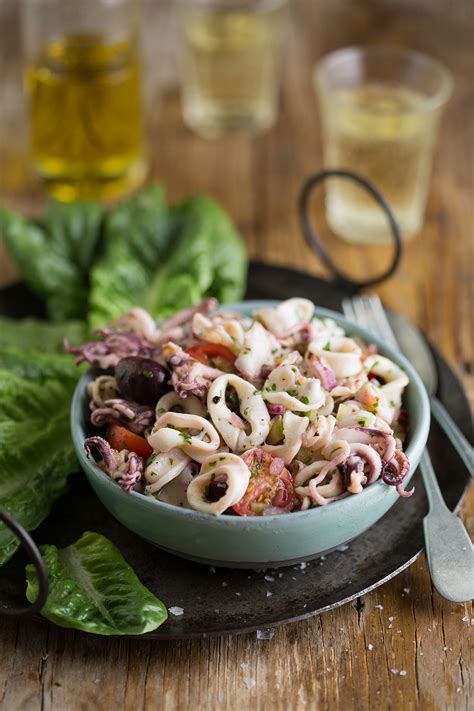 A delicious calamari salad recipe with tomatoes, olives & lemon ...