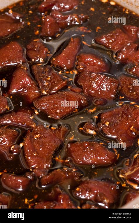 venison jerky in a soy sauce marinade Stock Photo - Alamy