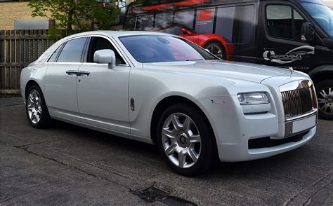 Rolls Royce Ghost wrapped in Pearl White - Reforma UK