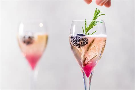 Champagne cocktail with blackberry and rosemary | Hungry for More