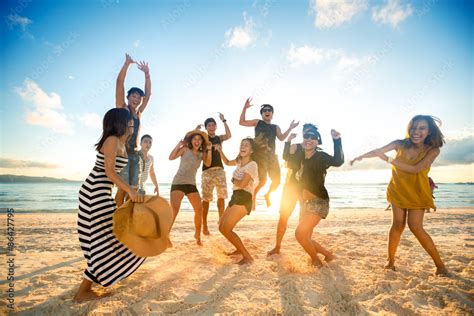 Happy people on beach Stock-Foto | Adobe Stock