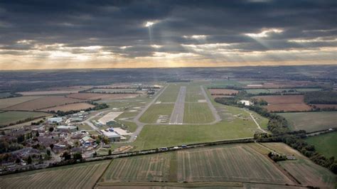 Pilot 'did not have time to react' in near-miss over Wittering - BBC News