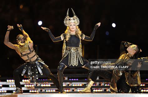 Singer Madonna performs during the NFL Super Bowl XLVI game halftime ...