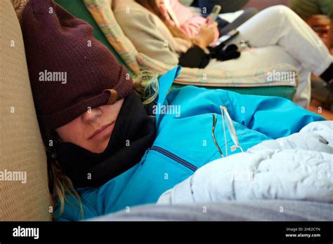 Female hiker sleeping and resting with a hat in the middle of hiking ...