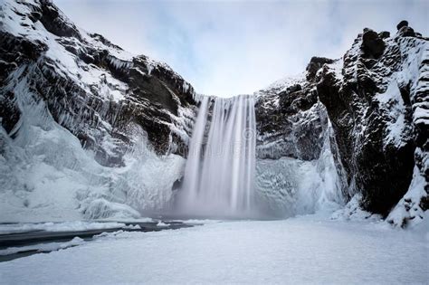 View of Skogafoss Waterfall in Winter. View of Skogafoss Waterfall in ...