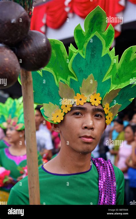 man with sinulog costume on the sinulog festival Stock Photo - Alamy